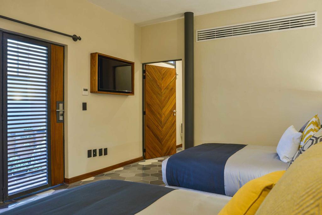 Hotel Criol كويريتارو المظهر الخارجي الصورة A room at the hotel